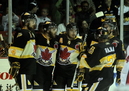 Bruce Bumstead/Brandon Sun
The Brandon Wheat Kings celebrate following Aaron Lewadniuk’s second-period goal against the Windsor Spitfires during 2010 MasterCard Memorial Cup action at Westman Place on Friday night. The Spitfires defeated the Wheat Kings 9-3.