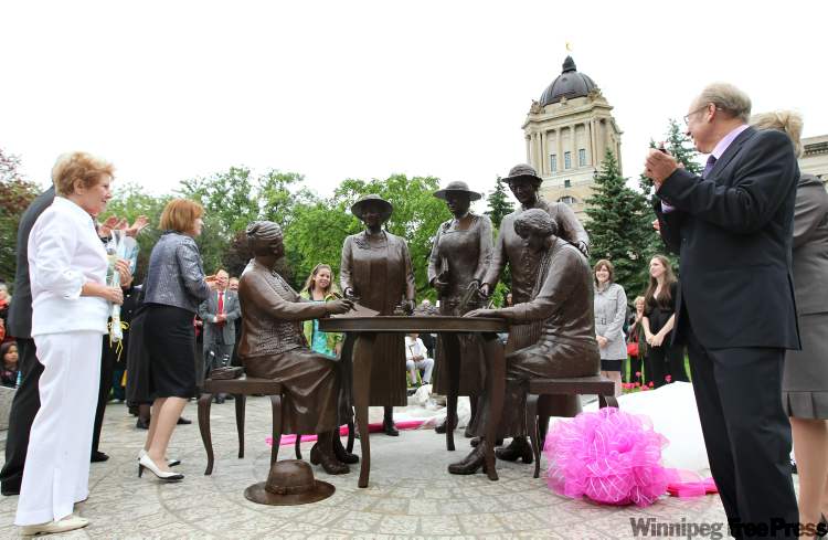 RUTH.BONNEVILLE@FREEPRESS.MB.CA
A statue of Nellie McClung and the 'Famous Five' who fought for women's suffrage was unveiled at the Manitoba Legislature Friday morning. Sculptor Helen Granger Young (far left) Mayor Sam Katz (right), Nellie McClung's granddaughter Marcia McClung and many other dignitaries and Winnipegers helped celebrate the occasion.
