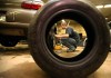 Tim Smith/Brandon Sun
Fountain Tire employee Jyles Wiklund installs winter tires on a vehicle on a rainy Tuesday ahead of expected overnight flurries. Business was booming at Fountain Tire on Tuesday.