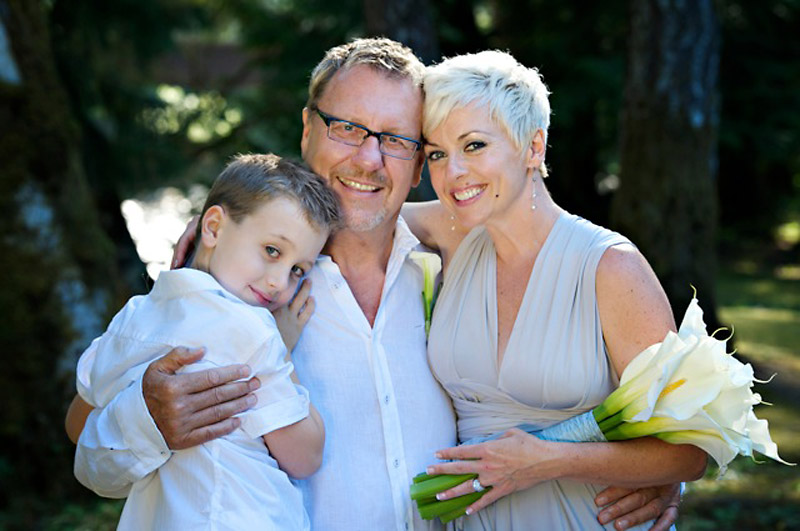 Submitted
Angela Kelman, her husband Doug von Dersch and their son Alex at the couple's summer wedding. Doug recently went back to his family's original surname after being raised as Doug Dersch.