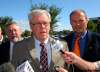 Bruce Bumstead / Brandon Sun
NDP leader Greg Selinger (middle) speaks to the media outside the Brandon Regional Health Centre during a campaign announcement with Brandon NDP candidates Jim Murray (left) and Drew Caldwell (right) on Monday morning.