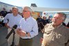 James O'Connor/Brandon Sun
NDP Leader Greg Selinger announces an additional ambulance for Brandon and expanded home care in front of on- and off-duty firefighter/paramedics at Brandon Firehall No. 1 Saturday afternoon. At left is Brandon East candidate Drew Caldwell, at right is Brandon West candidate Jim Murray. While in the city, Selinger also promised that an NDP government would support development of 2,500 new private-sector rental housing units across the province.