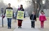 Tim Smith/Brandon Sun
Allison McCulloch with her son Xavier (third from left) and Lin Xu, with her daughter Sydney (right), walk the picket line on a warm Thursday afternoon. McCulloch and Xu are both assistant professors at Brandon University, On Thursday evening, a mediator declared an impasse in the labour dispute between BU and its faculty association.