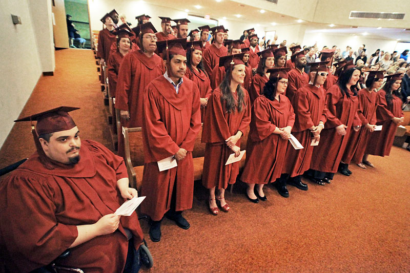 James O'Connor/Brandon Sun
The graduating class at the Assiniboine Community College Adult Collegiate graduation ceremonies Saturday at McDiarmid Drive Alliance Church.