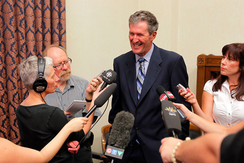 Boris Minkevich/Winnipeg Free Press
New Progressive Conservative Leader Brian Pallister speaks with reporters on Monday in Winnipeg.