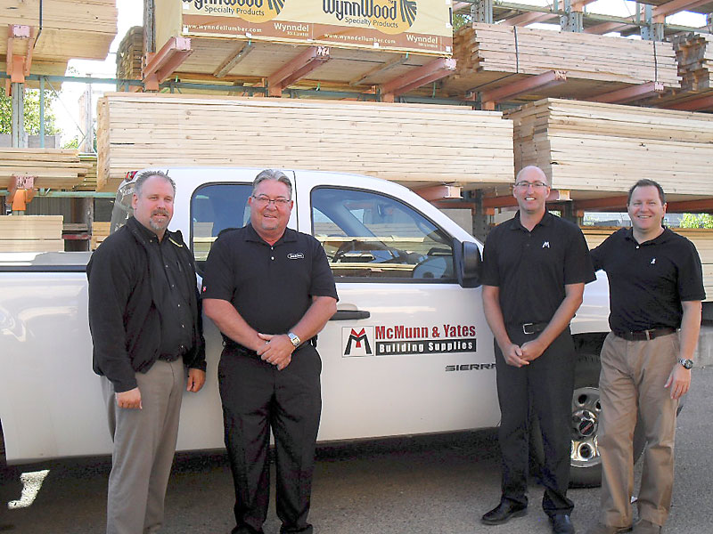 Submitted photo
McMunn & Yates Building Supplies manager Kevin Marcin, left,m Jenkins Flooring manager Brian Noto, McMunn & Yates president Jason Yates and Kerry Auriat, “A Sense of Home” campaign co-chair. McMunn & Yates has donated $100,000 to the Murray House Cancer Treatment Residence project.