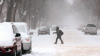 Bruce Bumstead/Brandon Sun
A pedestrian trudges through the snow-filled streets of Brandon on Monday afternoon.