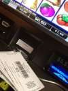 Grant Hamilton/Brandon Sun
Cash-out stubs sit on top of a VLT machine used to test the odds on the machines in the province.