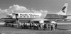 File
The first paying customers board a Pacific Western flight at McGill Field in 1981.