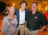 Colin Corneau/Brandon Sun
Federal Liberal Leader Justin Trudeau shares a laugh with former mayor, MLA and MP Rick Borotsik and his wife Norma after a speech at the Victoria Inn on Tuesday evening.