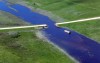 Bruce Bumstead/Brandon Sun
A road is washed out in the RM of Wallace on the Bosshill Creek on Thursday.