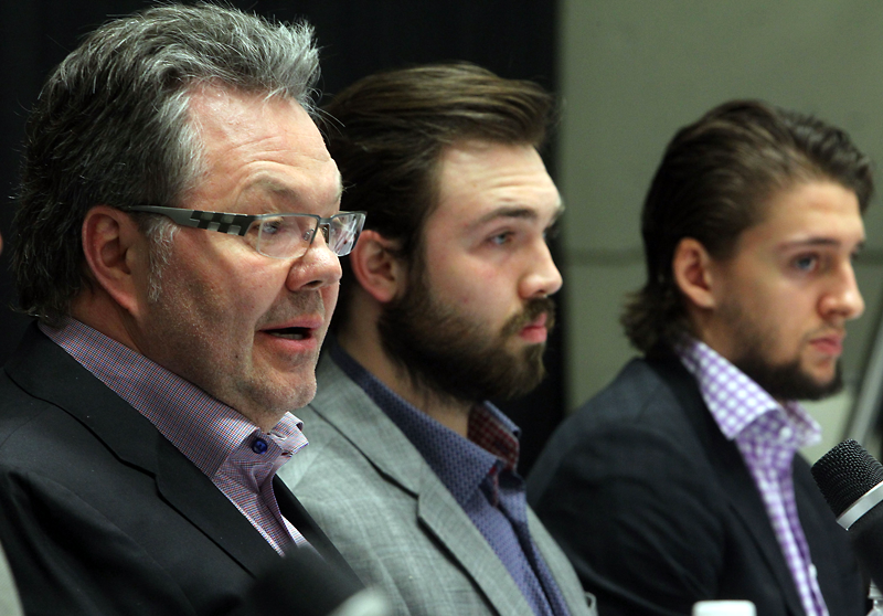 Colin Corneau/Brandon Sun
Wheat Kings head coach and general manager Kelly McCrimmon (left), joined by Peter Quenneville and Morgan Klimchuk, speaks at a press conference before Game 1 of the WHL championship on Friday afternoon.