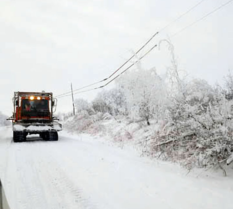 Submitted
A Manitoba Hydro truck ice rolling with a flex trak near Minnedosa on Tuesday. Ice-clearing operations will continue today, resulting in brief power outages in several Westman communities.