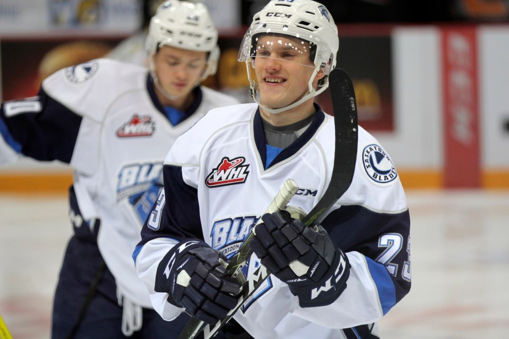 Perry Bergson/The Brandon Sun
Former Brandon Wheat Kings forward Braylon Shmyr of the Saskatoon Blades smiles at the bench after breaking a stick during warmup against the Wheat Kings on Saturday at Westman Place. (Perry Bergson/The Brandon Sun)
