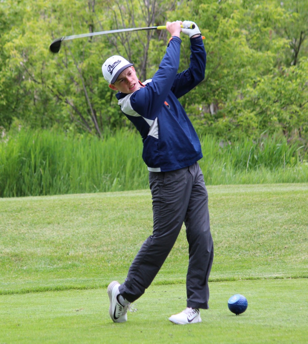Nathan Liewicki/The Brandon Sun
Zane MacDonald strikes a tee shot on the sixth hole at the Minnedosa Golf and Country Club on Friday. The 16-year-old from Minnedosa won the 15-and-under division Westman Junior Golf Tour title last season but decided not to return and play a few events on the Maple Leaf Junior Tour this summer.