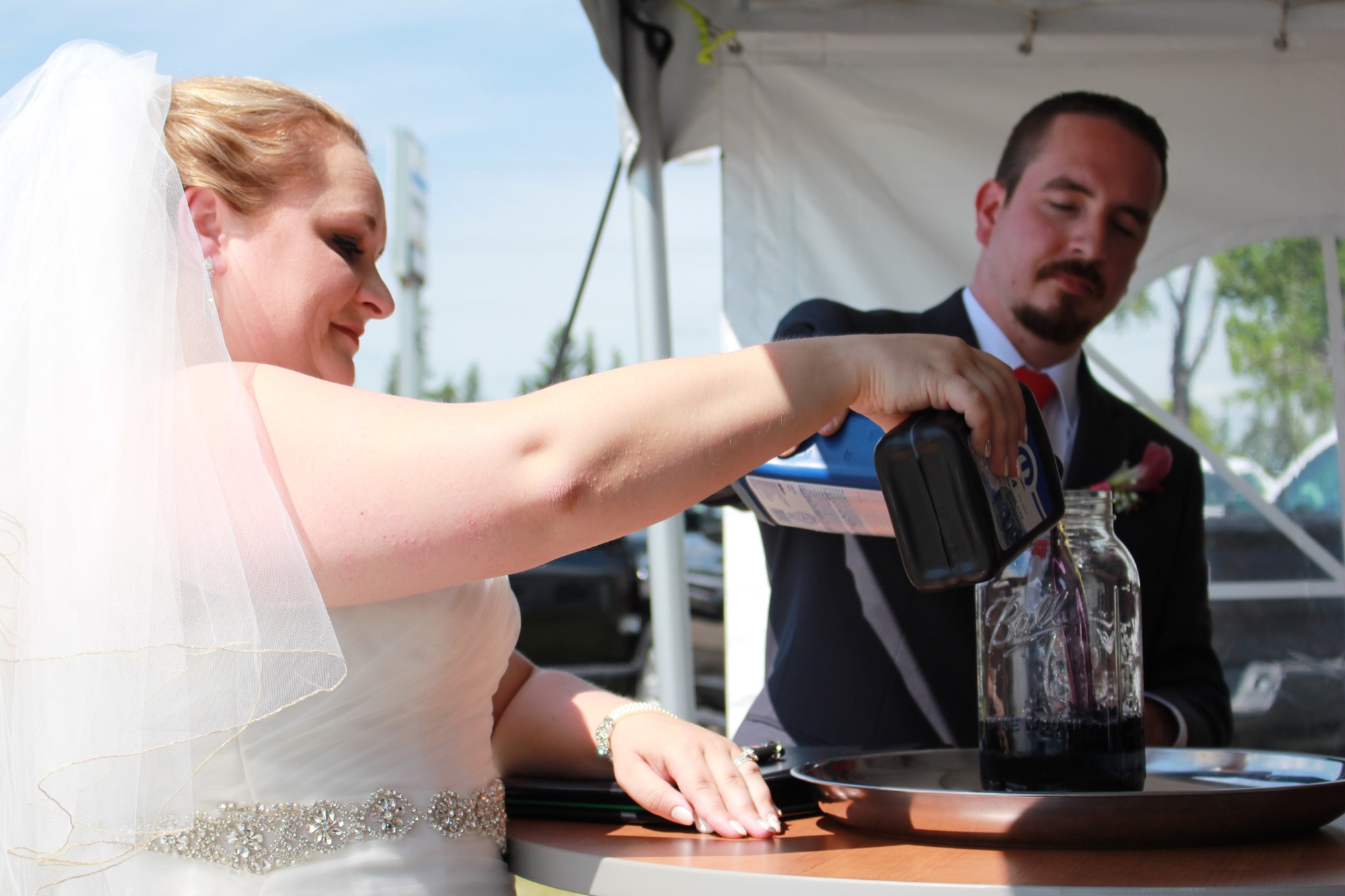 Couple weds between Brandon car dealerships where they work Brandon Sun