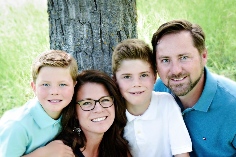 Submitted
Former Brandon Wheat King defenceman Scott Laluk poses with his wife Jennifer and sons Benjamin, 5, and Zachary, 8. The Brandonite played with the Wheat Kings for three seasons from 1992-95.