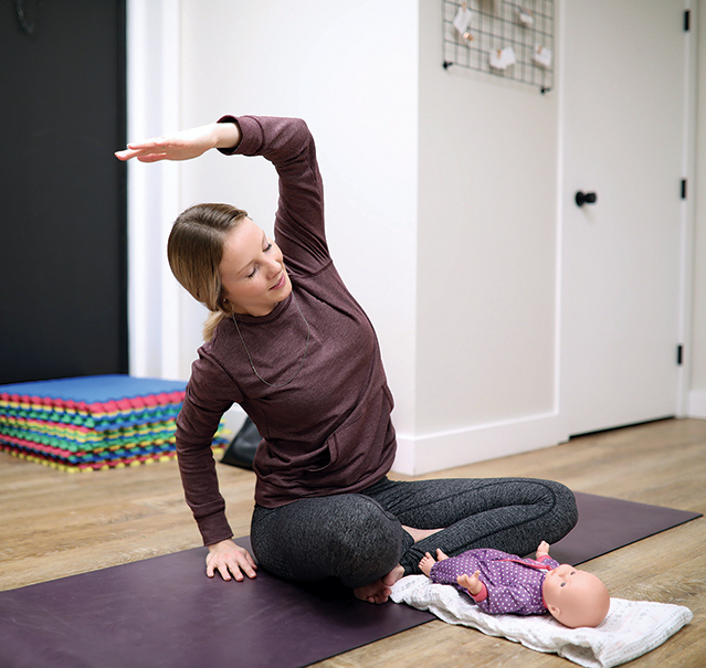 Yoga Instructor Tara Stokes leads a Me and Mini Me yoga class at Baby Bump on 18th Street.
(Tim Smith/The Brandon Sun)