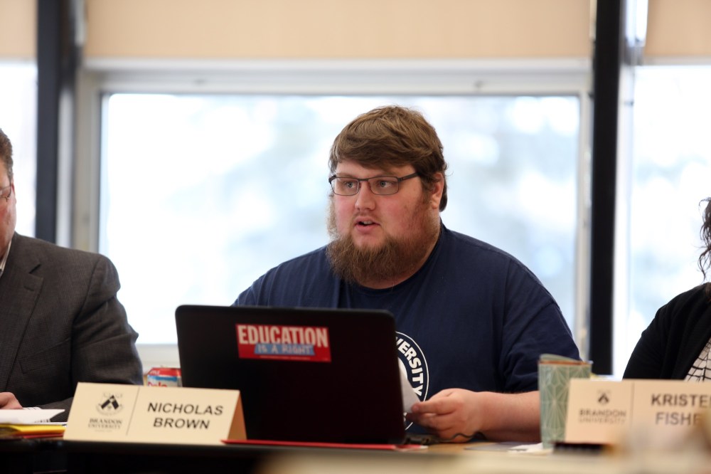 Michael Lee/The Brandon Sun
Brandon University Students' Union president Nick Brown explains his rationale for limiting tuition increases at the rate of inflation during a board of governors meeting at the Health Studies Complex on Saturday.