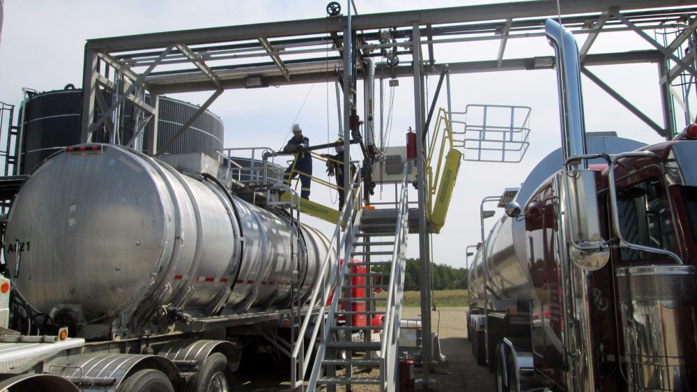 Submitted
Trucks are loaded at Western Asphalt Products’ facility in Brandon’s east industrial area. The company’s purchase of 71 acres of adjoining property has brought its total land mass to 151 acres.