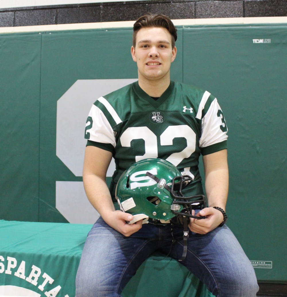 Nathan Liewicki/The Brandon Sun
Neelin Spartan Dayton Black inked his letter of intent to play football with the University of Saskatchewan Huskies on Saturday. The 18-year-old multi-sport athlete will play as a defensive end with the Huskies.