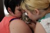 Michael Lee/The Brandon Sun
Monique Ward, left, and her daughter Jewel Ward comfort their cat Squid on Monday after she went missing from Massey Manor over the weekend.
