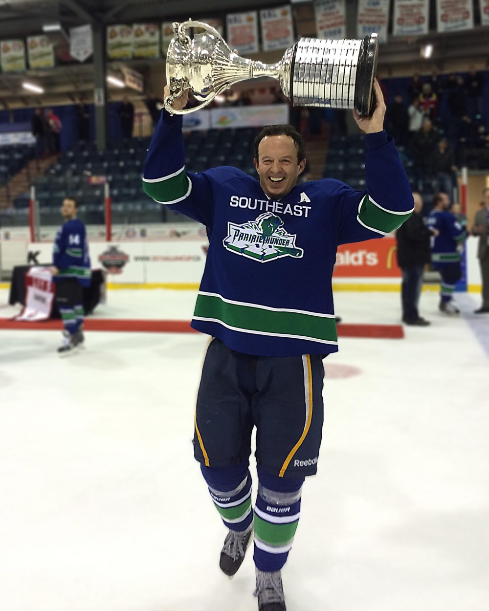 Submitted
Terry Yake hoists the Allan Cup after winning his second Canadian senior AAA hockey championship with the South East Prairie Thunder in 2015 in Clarenville, N.L.