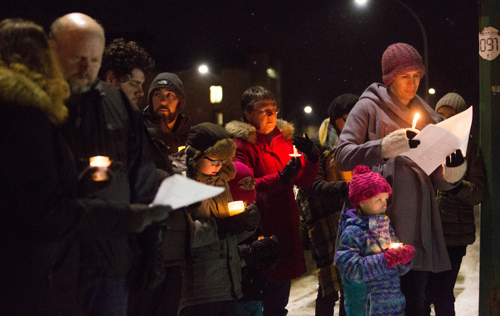 Guests remember victims of transgender violence at the Trans Day of Remembrance candlelight vigil at Knox United Church Tuesday. (Chelsea Kemp/The Brandon Sun)