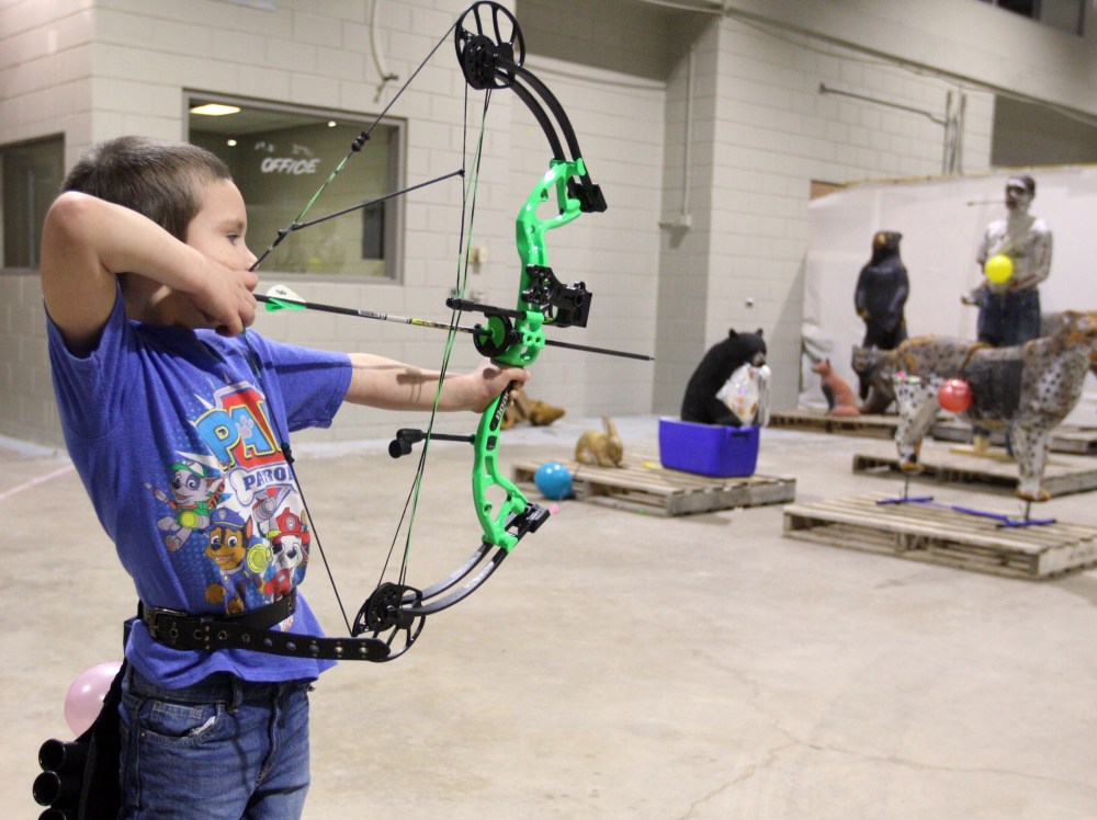 Melissa Verge/The Brandon Sun
Drayson Brown, 6, prepares to shoot one of his arrows inside the Keystone Centre on Sunday for the Brandon Wildlife Indoor 3-D Shoot.