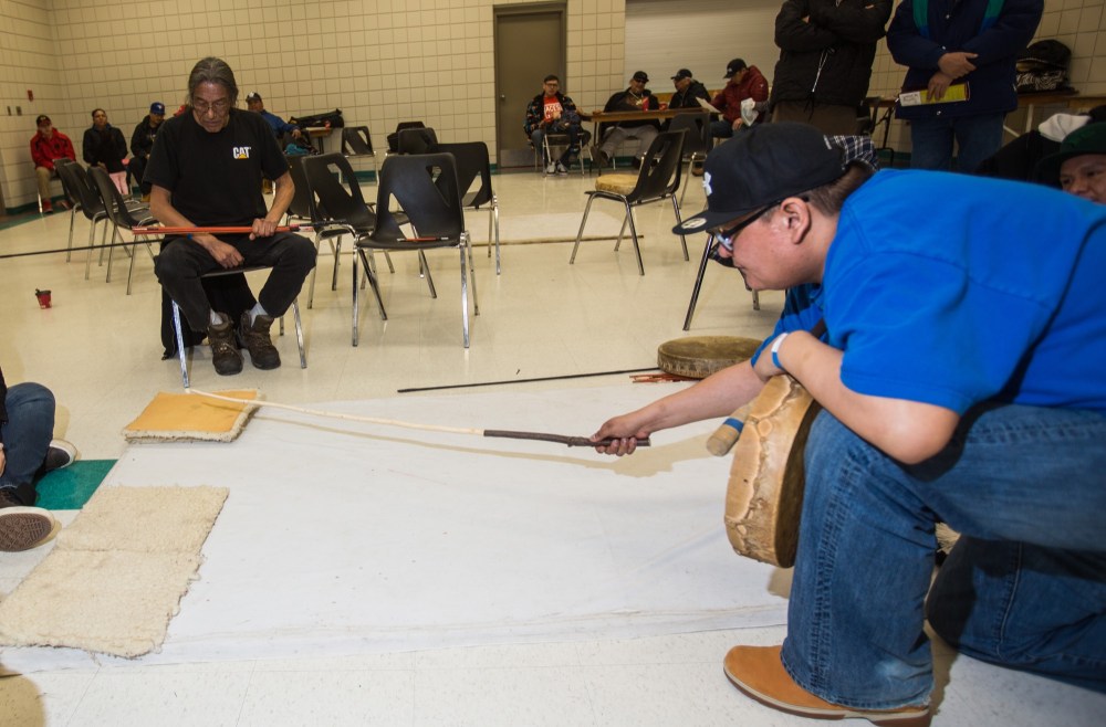 Chelsea Kemp/The Brandon Sun
Michael Demas plays a round of the moccasin game during Dakota Nation Winterfest on Saturday.