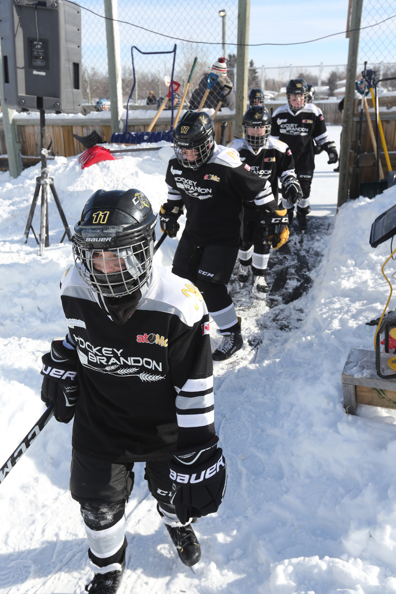 Young hockey players take the game outdoors during the McAtom Winter Classic Saturday at Westridge Community Centre. (Bud Robertson/The Brandon Sun)