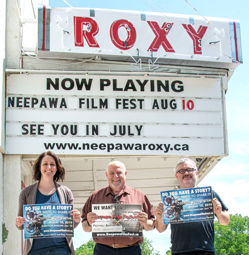 Neepawa Theatre Centre/Roxy Theatre chairwoman Kate Jackman-Atkinson, NACTV chairman Don Walmsley and Neepawa Film Festival chairman Jamie Willis stand in front of the Roxy Theatre in Neepawa. (Diane Warner photo)