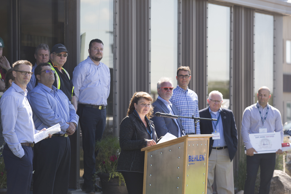 Laura Farmaner of SAFE Work Manitoba delivers remarks at the Behlen Industries SAFE Work certification ceremony on Tuesday. (Colin Slark/The Brandon Sun)