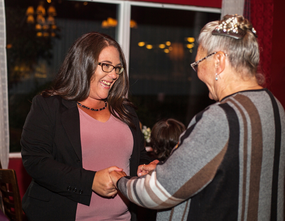 Brandon East NDP candidate Lonnie Patterson greets guests at the NDP headquarters at Lady of the Lake Tuesday. (Chelsea Kemp/The Brandon Sun)