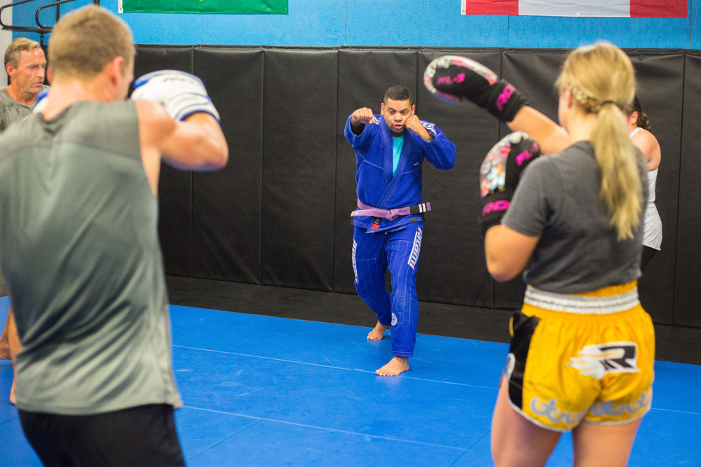 Aron Ramalho instructs students in Muay Thai at his recently opened gym AR Training Centre Friday. (Chelsea Kemp/The Brandon Sun)