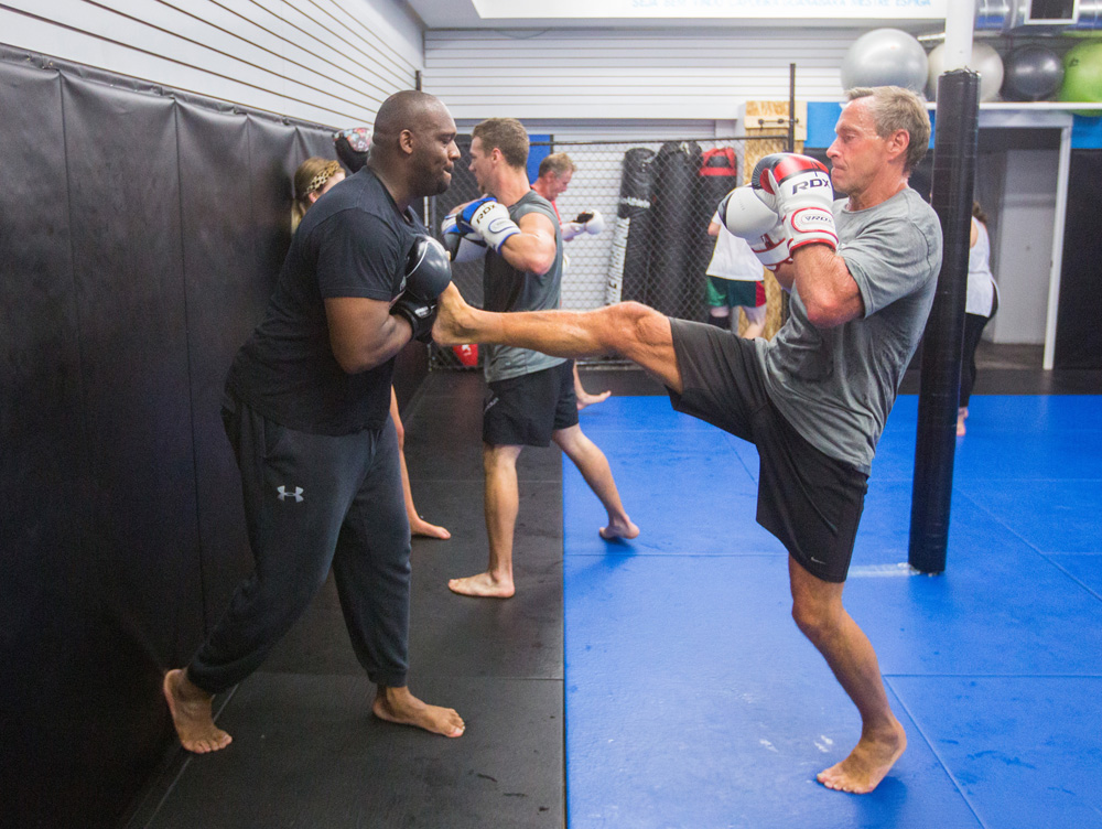 Ian Greenidge, left, spars with Don McKibbin at a Muay Thai training sessions at Aron Ramalho's recently opened gym AR Training Centre on Friday. (Chelsea Kemp/The Brandon Sun)