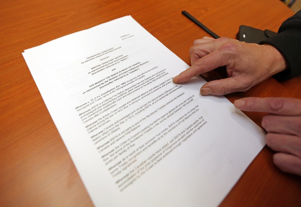 Matt Goerzen/The Brandon Sun
Chalmers shows off the framework agreement he secured with the federal government.