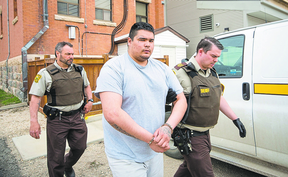 Therae Racette-Beaulieu leaves the Minnedosa courthouse earlier this year after being sentenced to 18 years in prison for shooting an RCMP officer in the head last August near Onanole. He was subsequently charged with attempted murder after allegedly trying to kill a fellow inmate approximately one week after his arrest. (File)