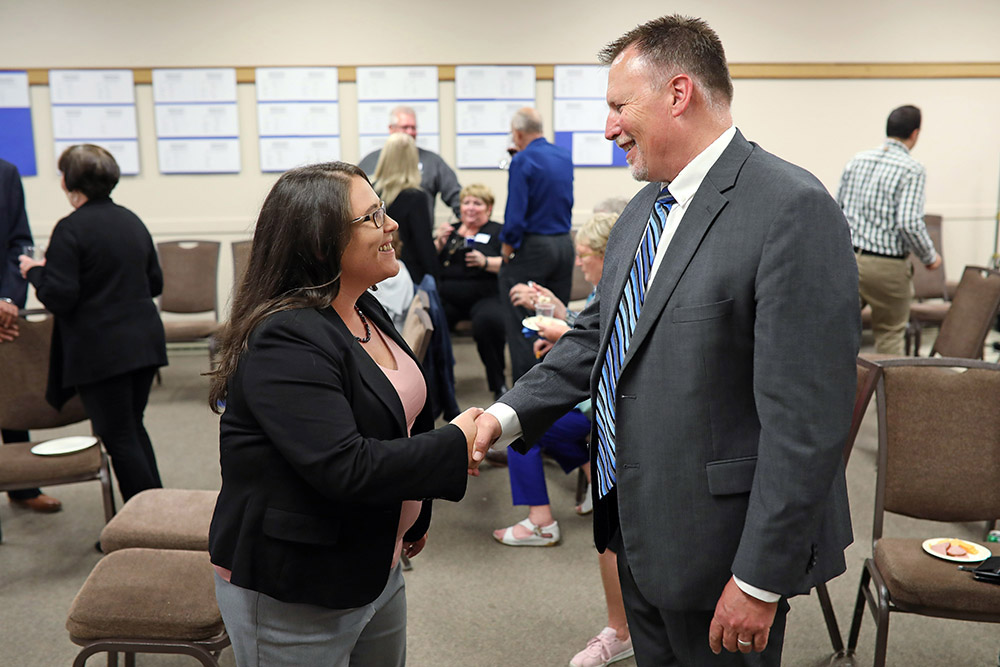 Brandon East  NDP candidate Lonnie Patterson congratulates Progressive Conservative candidate Len Isleifson on his victory at the Discovery Centre after Isleifson won the Brandon East seat in the legislature in the provincial election. (File)