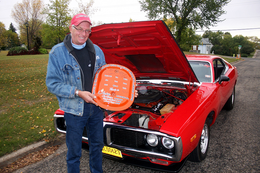 Lindsay Rystephanuk holds up the plate that covers the filter of his 1973 Dodge Charger in late 2017. Rystephanuk told the Sun he was “crushed” when he heard this year’s World of Wheels convention was cancelled due to the COVID-19 outbreak. (File)