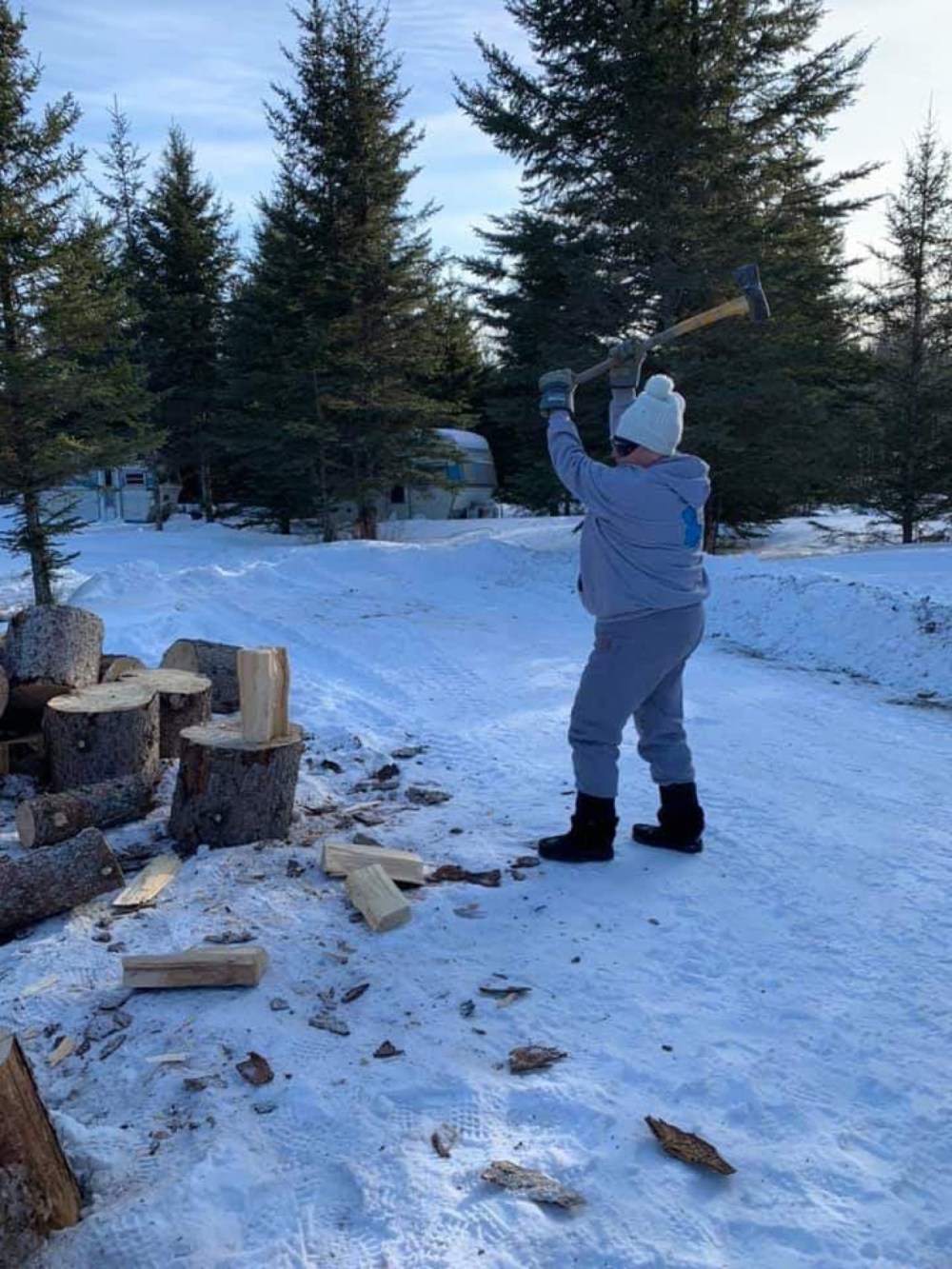 Photo courtesy Ryan Catcheway
Roberta Bone of Keeseekoowenin Ojibway First Nation chops some wood on a beautiful spring afternoon late last week.