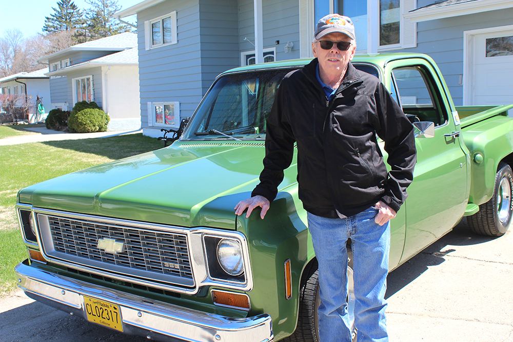 Keith Bogue poses for a photo with his 1974 Chevrolet Cheyenne this past Monday in Brandon. This truck has been a consistent part of Bogue's life for the last 46 years. (Kyle Darbyson/The Brandon Sun)