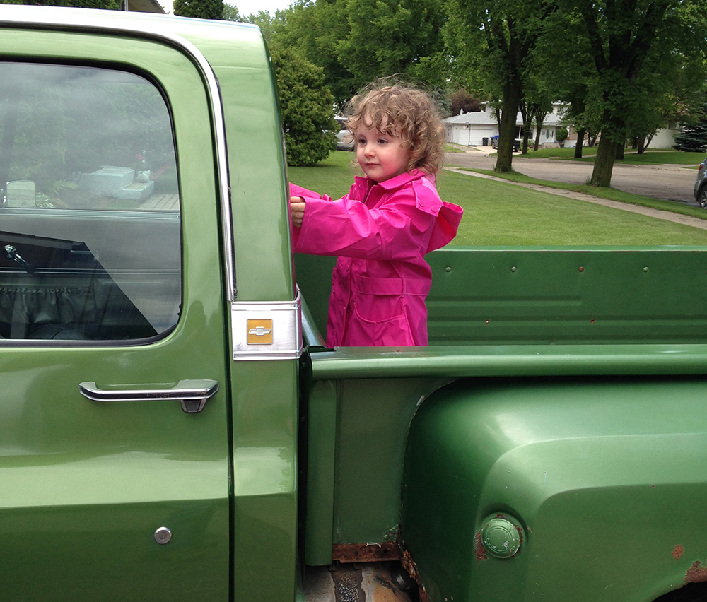 Keith Bogue's granddaughter Rosie hopes into the back of his 1974 Chevrolet Cheyenne in 2006. (Submitted)