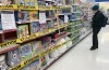 Tape is shown on shelves preventing the sale of certain products at a pharmacy in Montreal, Sunday, January 3, 2021, as the COVID-19 pandemic continues in Canada and around the world. THE CANADIAN PRESS/Graham Hughes