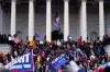 Trump supporters rally Wednesday, Jan. 6, 2021, at the Capitol in Washington. Two Canadian nurses who spoke at an anti-lockdown rally in Washington, D.C., on the day of the deadly storming of the Capitol are under investigation by their regulatory body. THE CANADIAN PRESS/AP/Julio Cortez