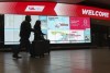 A couple makes their way through Montreal Trudeau Airport in Montreal, on Thursday, January 7, 2021. Canada's new testing requirement for international travellers has prompted hundreds of people to miss flights in the first week of the program's rollout.THE CANADIAN PRESS/Paul Chiasson