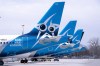 Air Transat aircraft are seen on the tarmac at Montreal-Trudeau International Airport in Montreal, on Wednesday, April 8, 2020. THE CANADIAN PRESS/Paul Chiasson