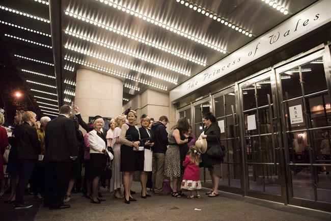 People line up at the Princess of Wales Theatre in Toronto on Saturday, May 19, 2018. The annual Dora Mavor Moore Awards, which honour Toronto's performing arts sector, will not be presented this year due to a lack of live shows during the COVID-19 pandemic. THE CANADIAN PRESS/Marta Iwanek