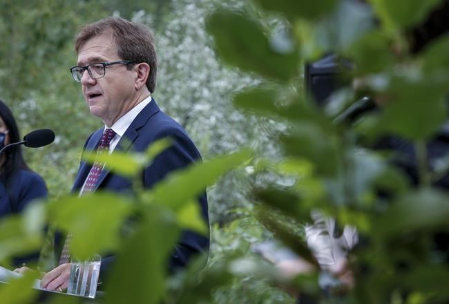 Federal Environment Minister Jonathan Wilkinson makes an announcement in Calgary on Tuesday, July 20, 2021. Wilkonson said extreme weather conditions across the country should be a wake-up call for people resisting taking action against climate change. THE CANADIAN PRESS/Jeff McIntosh
