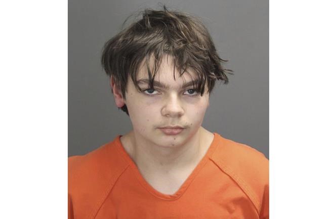 This booking photo released by the Oakland County, Mich., Sheriff's Office shows Ethan Crumbley, 15, who is charged as an adult with murder and terrorism for a shooting that killed four fellow students and injured more at Oxford High School in Oxford, Mich., authorities said Wednesday, Dec. 1, 2021. (Oakland County Sheriff's Office via AP)